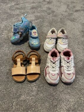 Girls shoes bundle size 9. Great used condition. The frozen shoes are light up.
